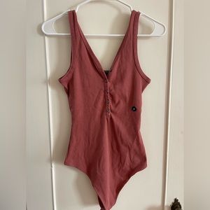 Rose/mauve colored bodysuit